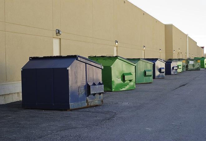 a view of a dumpster truck on a construction site in Lake Cormorant